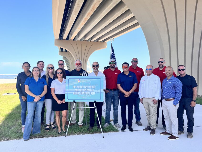 Lee County officials and other community leaders celebrate the opening of the new Big Carlos Pass Bridge