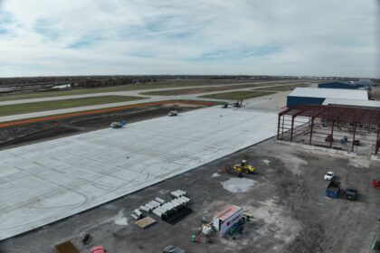 An overhead photograph taken with a drone of a concrete apron — or area near the runway — at the Gary/Chicago airport.